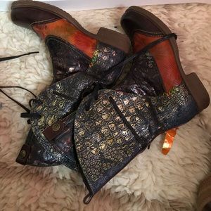 Unique cowboy looking boots.